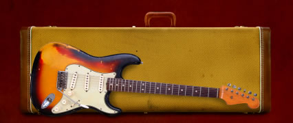Well used Fender Strat and case